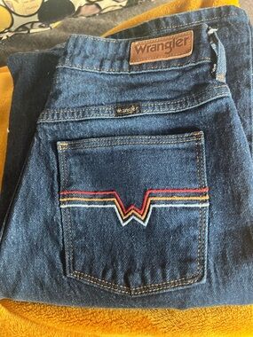 Wrangler dark blue denim high-rise flare jeans with gold stitching